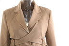 Stylish khaki trench coat for women featuring a classic lapel and belted waist design