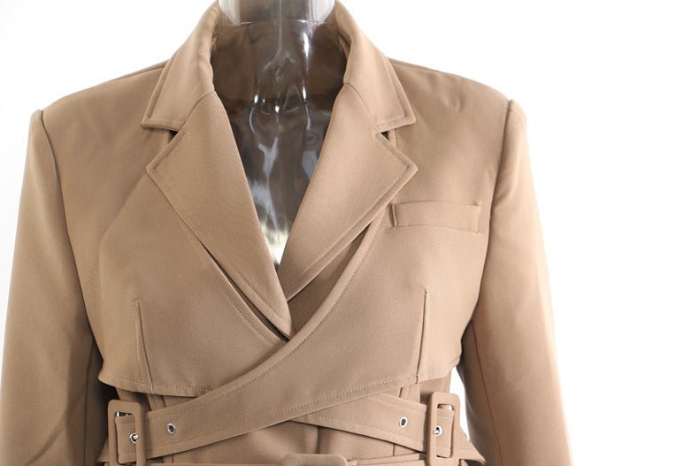 Stylish khaki trench coat for women featuring a classic lapel and belted waist design