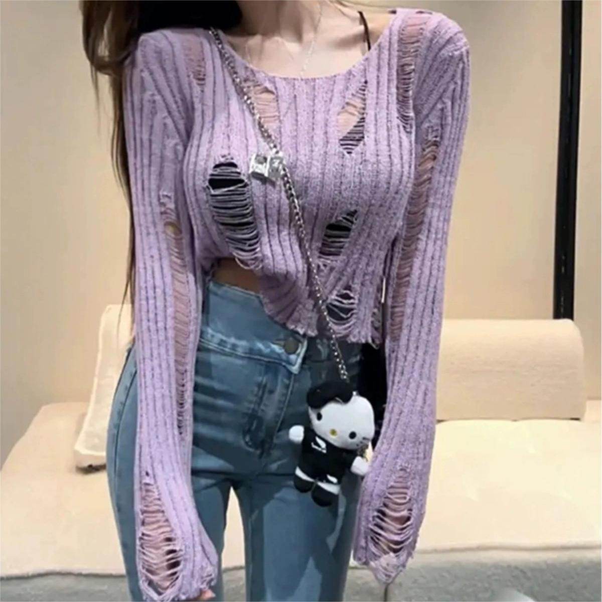 Fashionable knitted blouse with cut-outs in lavender color for a trendy casual look