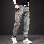 Koi Dynasty Embroidered Jeans featuring intricate designs and a relaxed fit for a stylish look