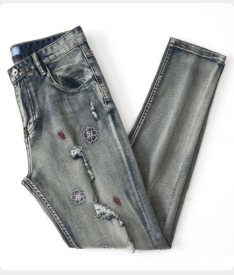 Koi Dynasty Embroidered Jeans with Distressed Detailing and Colorful Floral Embroidery