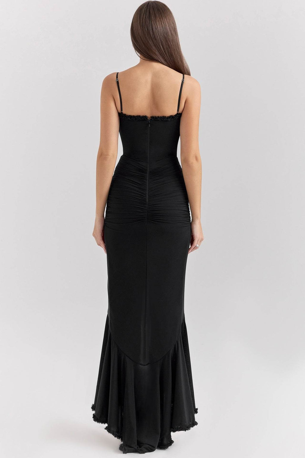 Back view of the Lace Charm Intense Black Dress with elegant ruching and mermaid hemline