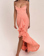 Wearing the Lace Charm Pink Champagne Dress, featuring ruffle details and a flattering silhouette