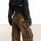 Leopard print cargo pants by AM Vision RO featuring a stylish design and comfortable fit