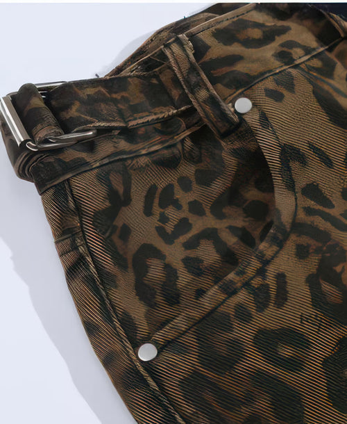 Close-up view of AM Vision RO leopard print cargo pants showcasing the belt and fabric texture