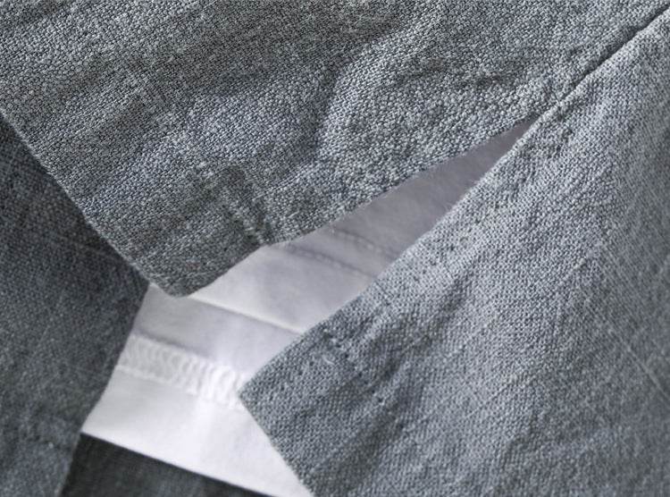Close-up of a gray AM Vision RO Linen Cardigan Shirt showcasing the fabric texture and collar detail