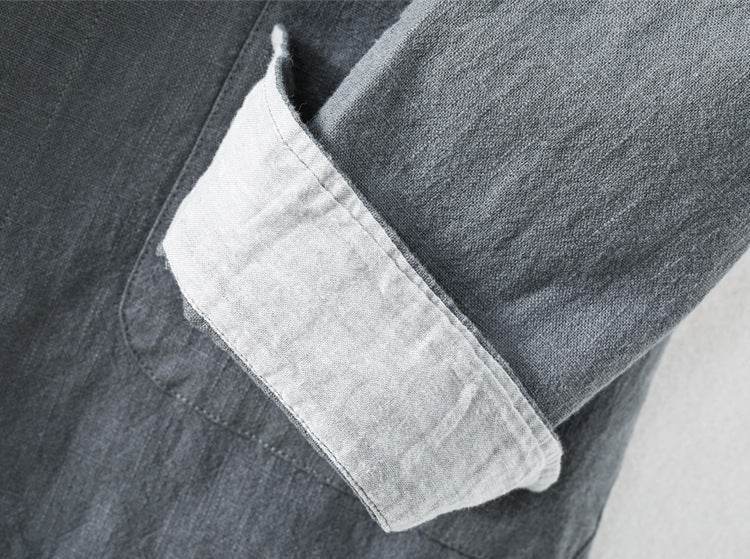 Close-up of a grey Linen Cardigan Shirt showcasing the rolled cuff detail