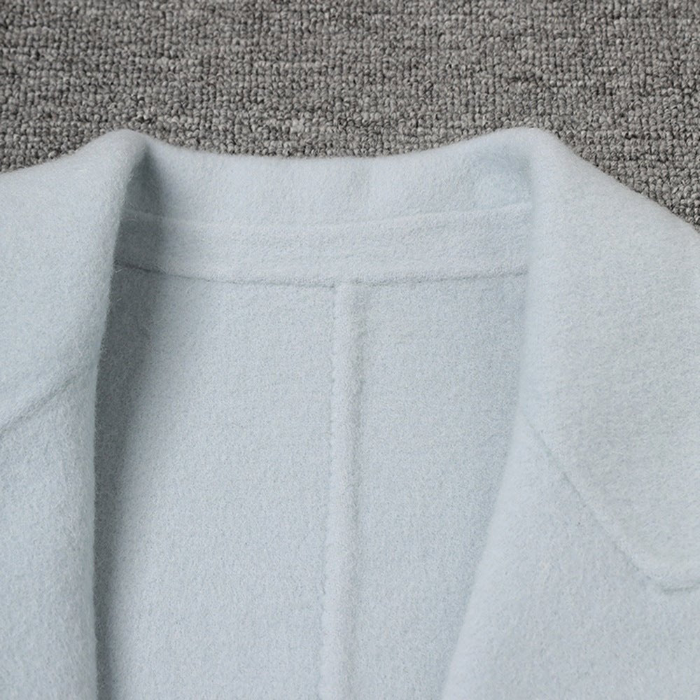 Close-up of the collar of a Long Baby Blue Wool Coat made by AM Vision RO