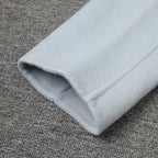 Detail of a Long Baby Blue Wool Coat sleeve showcasing soft fabric and clean stitching