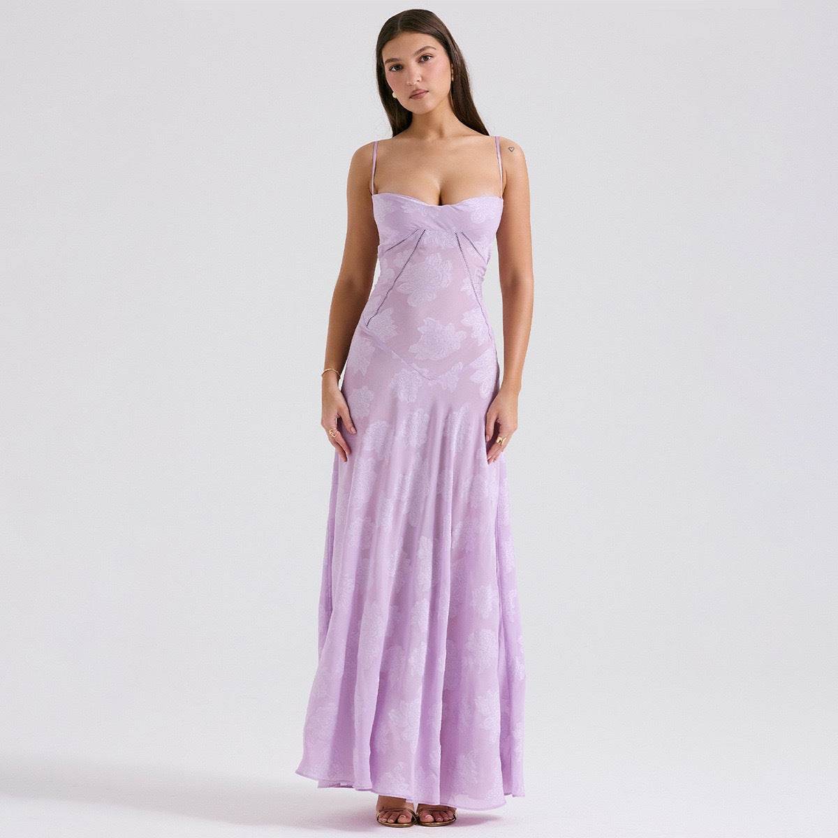 Model wearing a Long Dress Eternal Grace in lavender with a form-fitting design and thin straps
