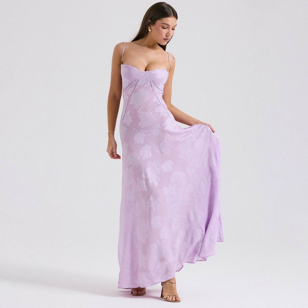 Model wearing Long Dress Eternal Grace in lilac with a flowy silhouette and delicate straps