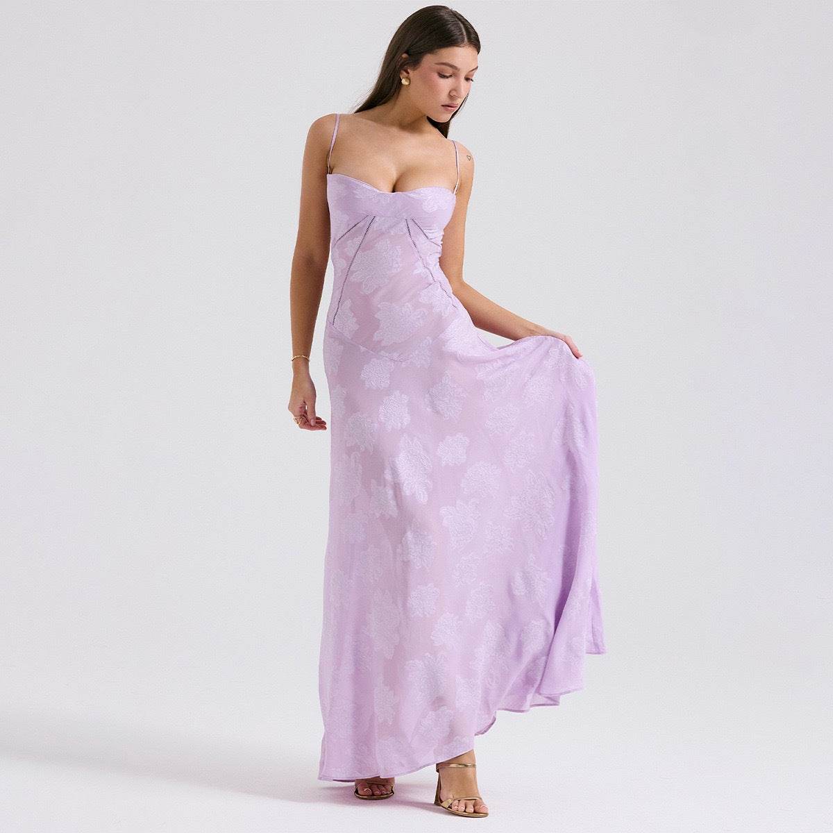 Model wearing Long Dress Eternal Grace in lilac with a flowy silhouette and delicate straps