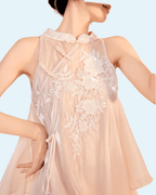 Elegant Long Dress with Embroidery in soft fabric featuring delicate floral designs