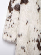 Long Faux Fur Effect Coat in white and brown pattern with soft textured fabric