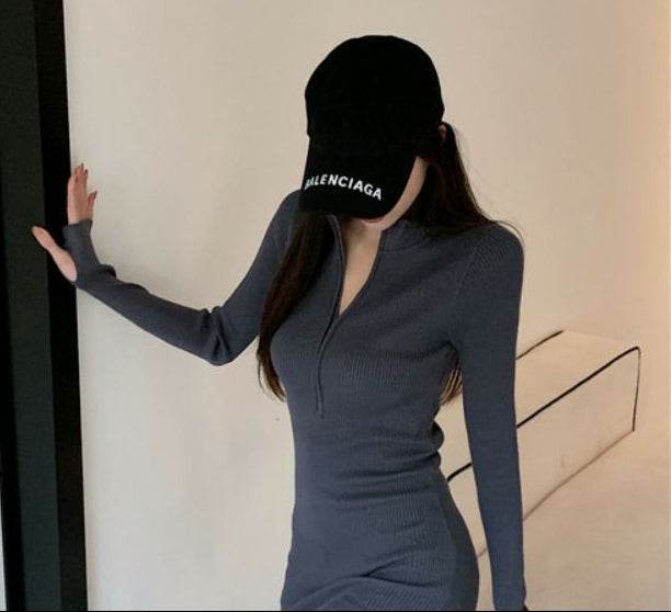 Casual gray long sleeve short dress with a zip-up front and slim fit design