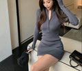 Stylish gray long sleeve short dress with a zip detail and fitted design for a chic look