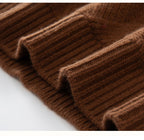 Close-up of a brown luxury cashmere sweater for women with ribbed sleeves and a soft texture