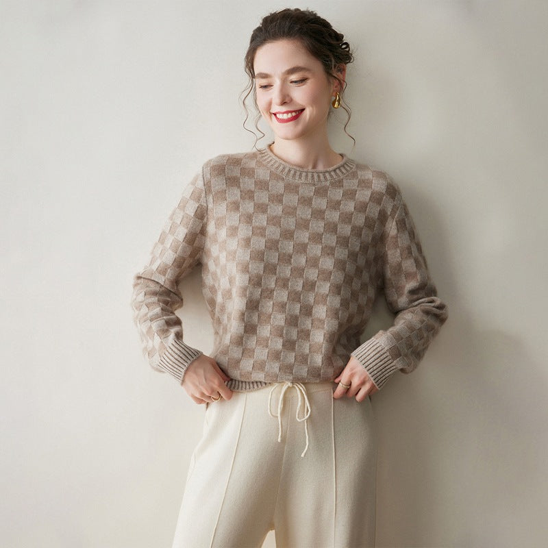Luxury women's knit sweater in a checkered pattern, perfect for stylish and cozy outfits