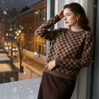 Luxury women's knit sweater in a brown checkerboard pattern, perfect for winter fashion.