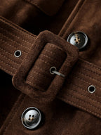 Close-up of the buckle and buttons on the Maillard Goat Suede Utility Jacket in rich brown color