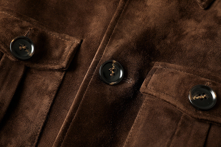 Close-up of the Maillard Goat Suede Utility Jacket showcasing its polished buttons and rich brown texture