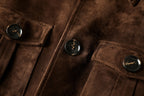 Close-up of the Maillard Goat Suede Utility Jacket showcasing its polished buttons and rich brown texture
