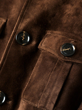Close-up of Maillard Goat Suede Utility Jacket featuring buttoned pockets and soft texture