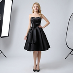 Elegant Maison Noir Strapless Dress in black with a flowing skirt and fitted bodice