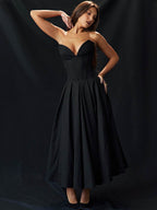 Elegant black AM Vision RO maxi dress with deep neckline and flattering fit for stylish occasions