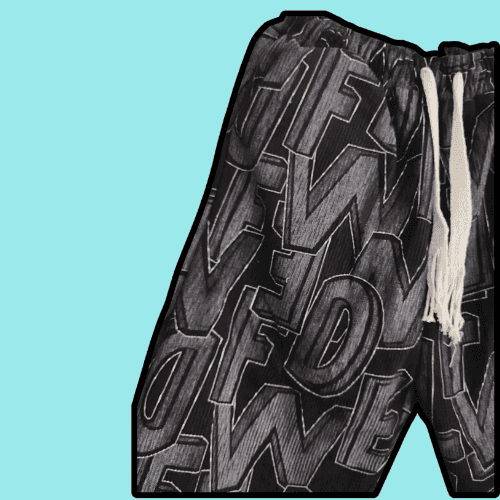 Men's graffiti design pants with bold black and gray street art print and white drawstring waistband