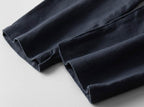 Close-up of dark blue Men's Linen Pants showcasing the soft fabric and tailored cut