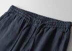 Close-up of Men's Linen Pants waistband featuring elastic and drawstring for comfortable fit