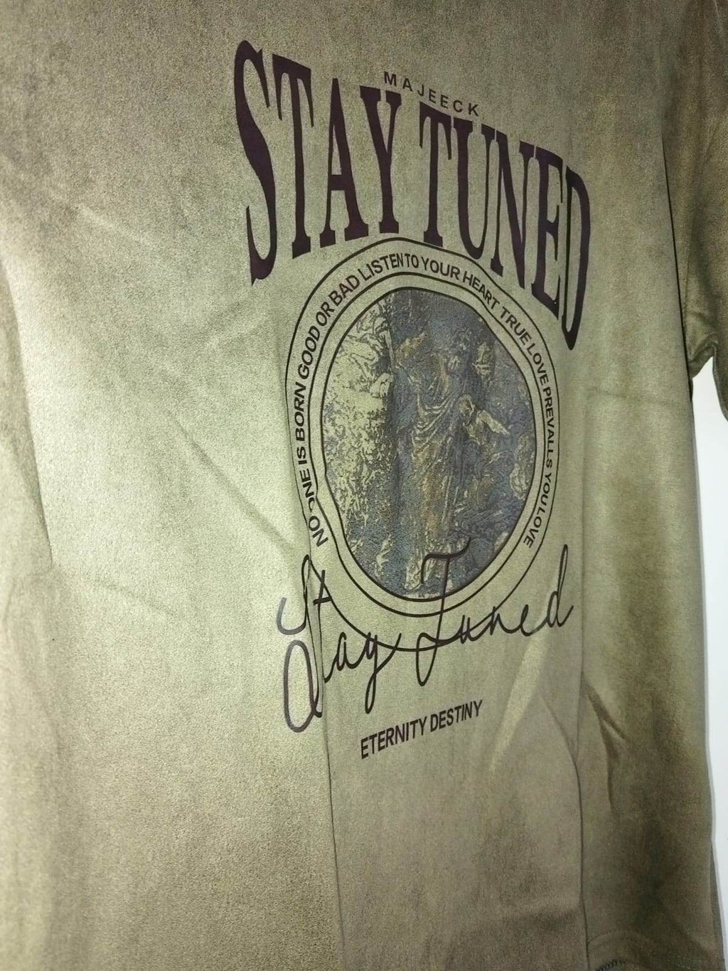 Men's velvet t-shirt featuring a unique graphic and stylish text design in earthy tones