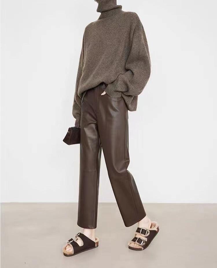 Stylish outfit featuring Merard Luxe Sheepskin Pants paired with a cozy sweater and casual sandals