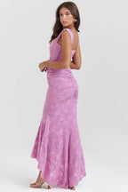 Elegant pink Mermaid Style Dress with ruched detailing and a flared hem for a flattering silhouette