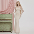 Midnight Muse Off-Shoulder Fishtail Dress in cream with sheer long sleeves and fitted silhouette