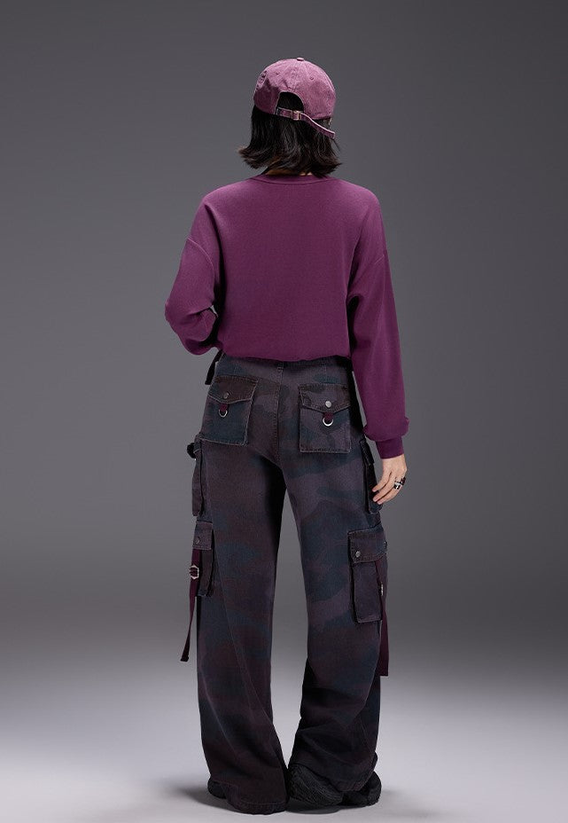 Back view of model wearing Midnight Paws Street Top paired with stylish cargo pants for a trendy look