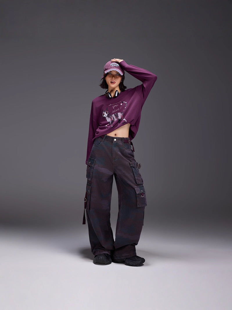Model wearing Midnight Paws Street Top in purple with stylish cargo pants for a trendy urban look