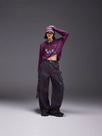 Model wearing Midnight Paws Street Top in purple with stylish cargo pants for a trendy urban look