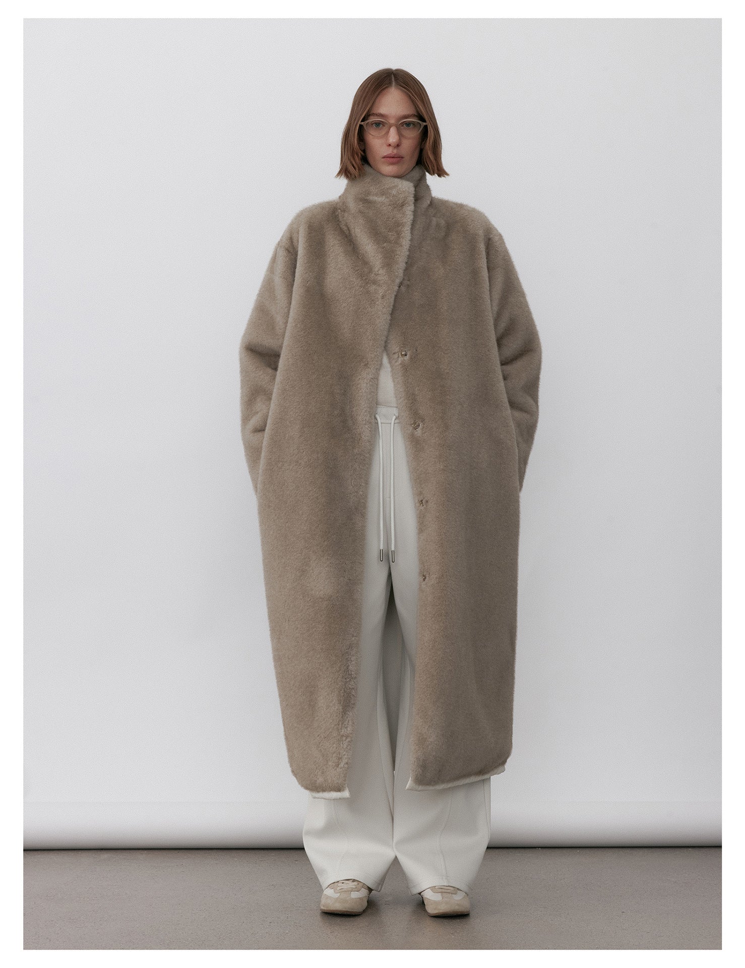 Milk Tea Reversible Luxe Fur Trench with a sleek design and cozy fit for stylish warmth