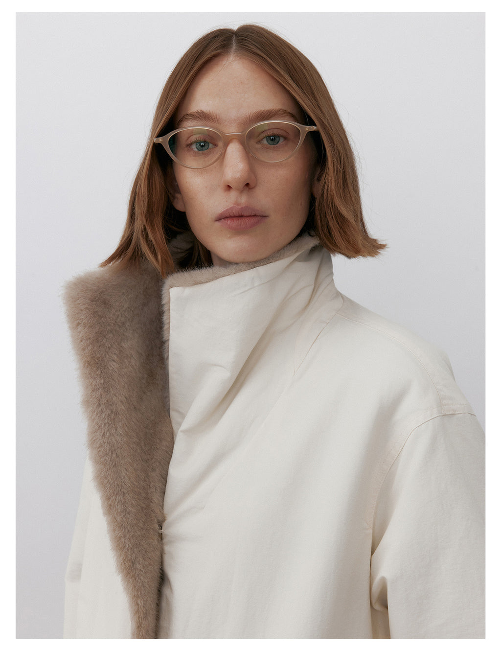 Milk Tea Reversible Luxe Fur Trench with a stylish design for versatile winter wear