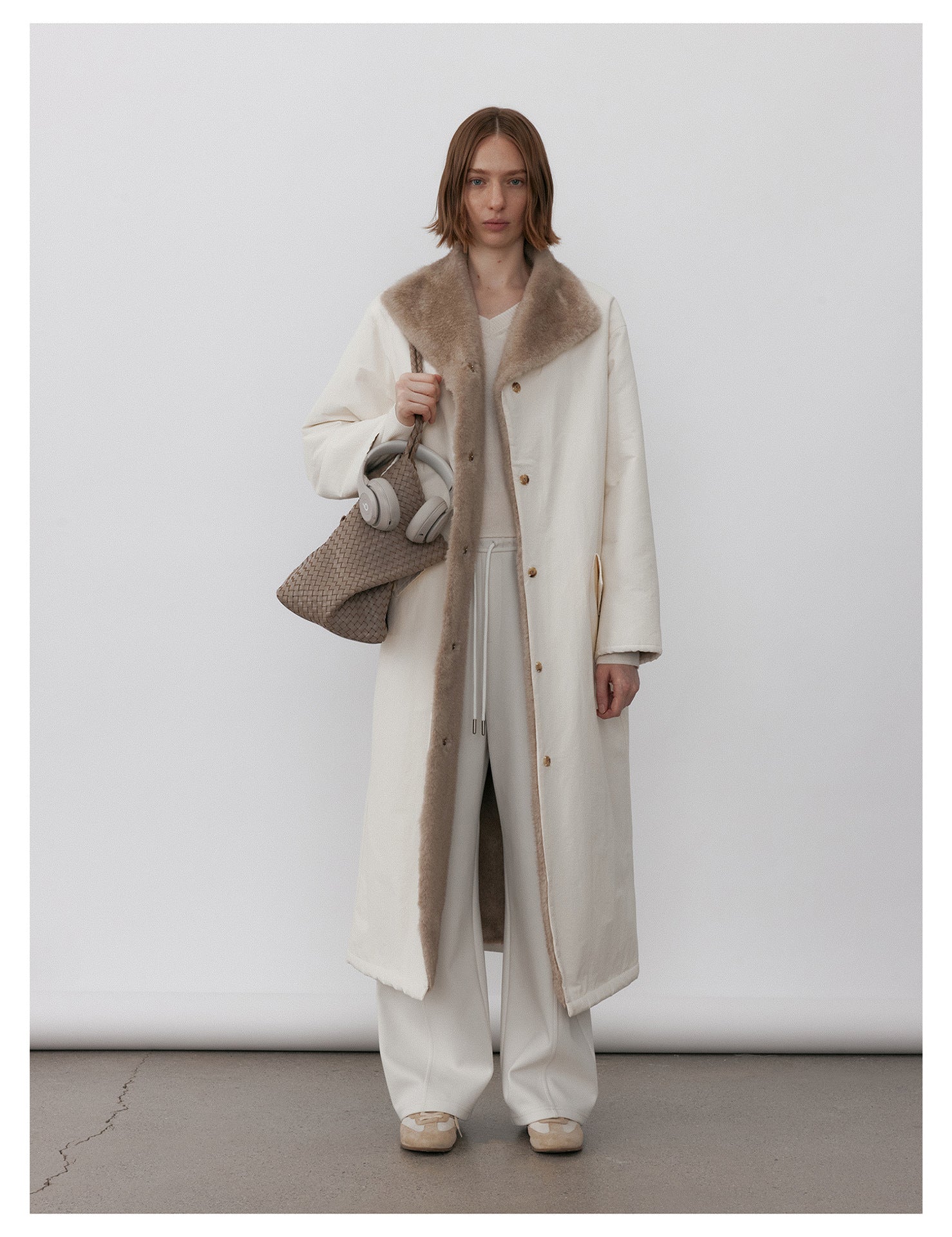 Milk Tea Reversible Luxe Fur Trench Coat featuring a cozy design and stylish collar for a chic look