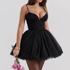 Elegant black Mini Bell Dress with spaghetti straps and a flared tulle skirt for a chic look