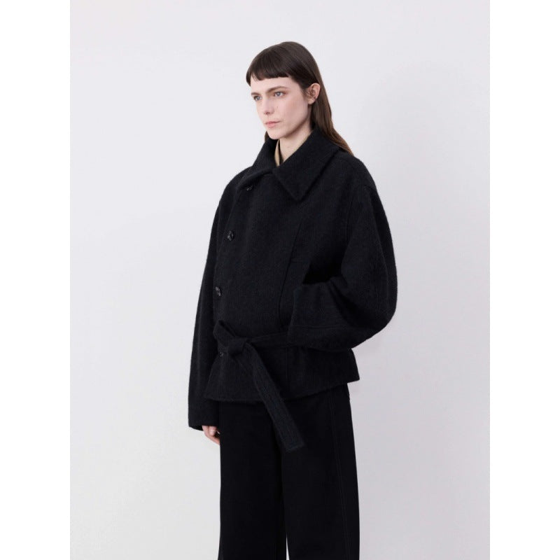 AM Vision RO Minimalist Belted Short Coat in black with a button front and relaxed fit