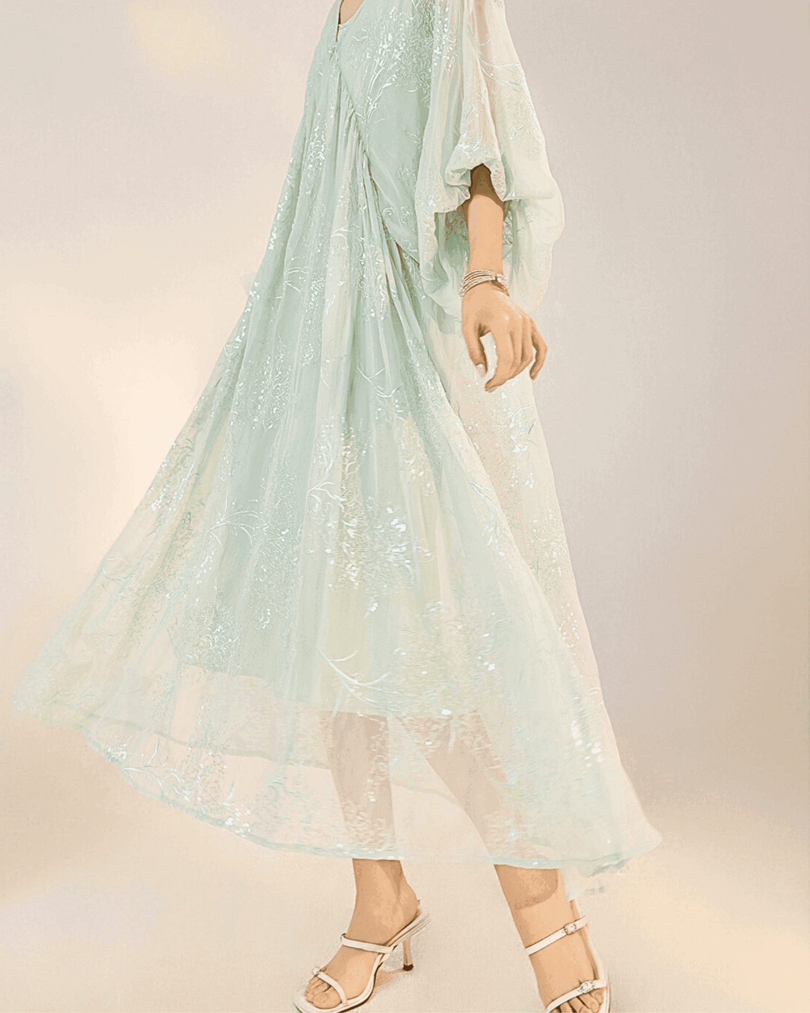Mint Blue Dress with Embroidery featuring a flowy design and sheer fabric for a stylish look