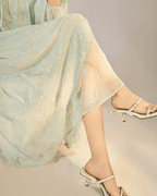 Mint Blue Dress with Embroidery featuring a flowing design and elegant detailing for a chic summer look