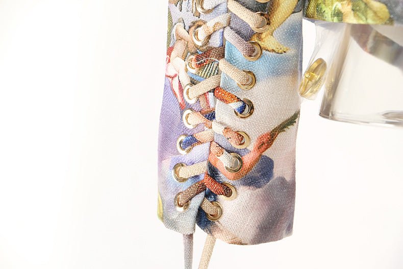 Detail of Mocha Mousse Cape Jacket showcasing intricate lacing and vibrant fabric patterns