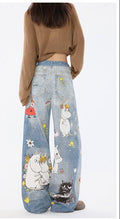 Moomins Cartoon Jeans featuring colorful designs of Moomin characters on a wide-leg denim style