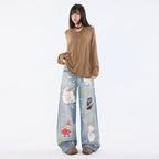 Trendy Moomins Cartoon Jeans with whimsical character designs in a relaxed fit