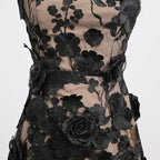 Close-up of a Naked Illusion Dress With Embroidered Flowers showcasing intricate floral details